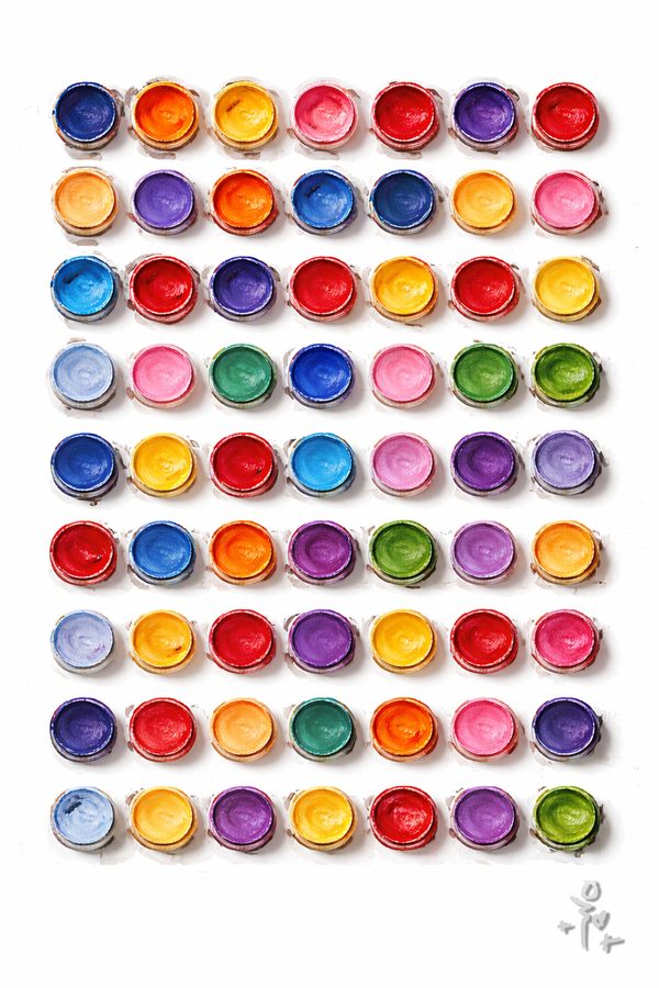 Color Vessels: rows of open paint cups in every color, seen from above on white