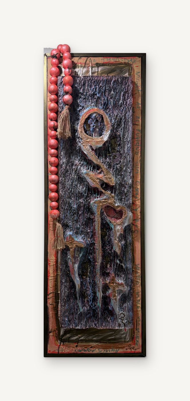 Firma: a tall narrow panel with a torch-melted, painted signature in relief, a strand of red beads across the top