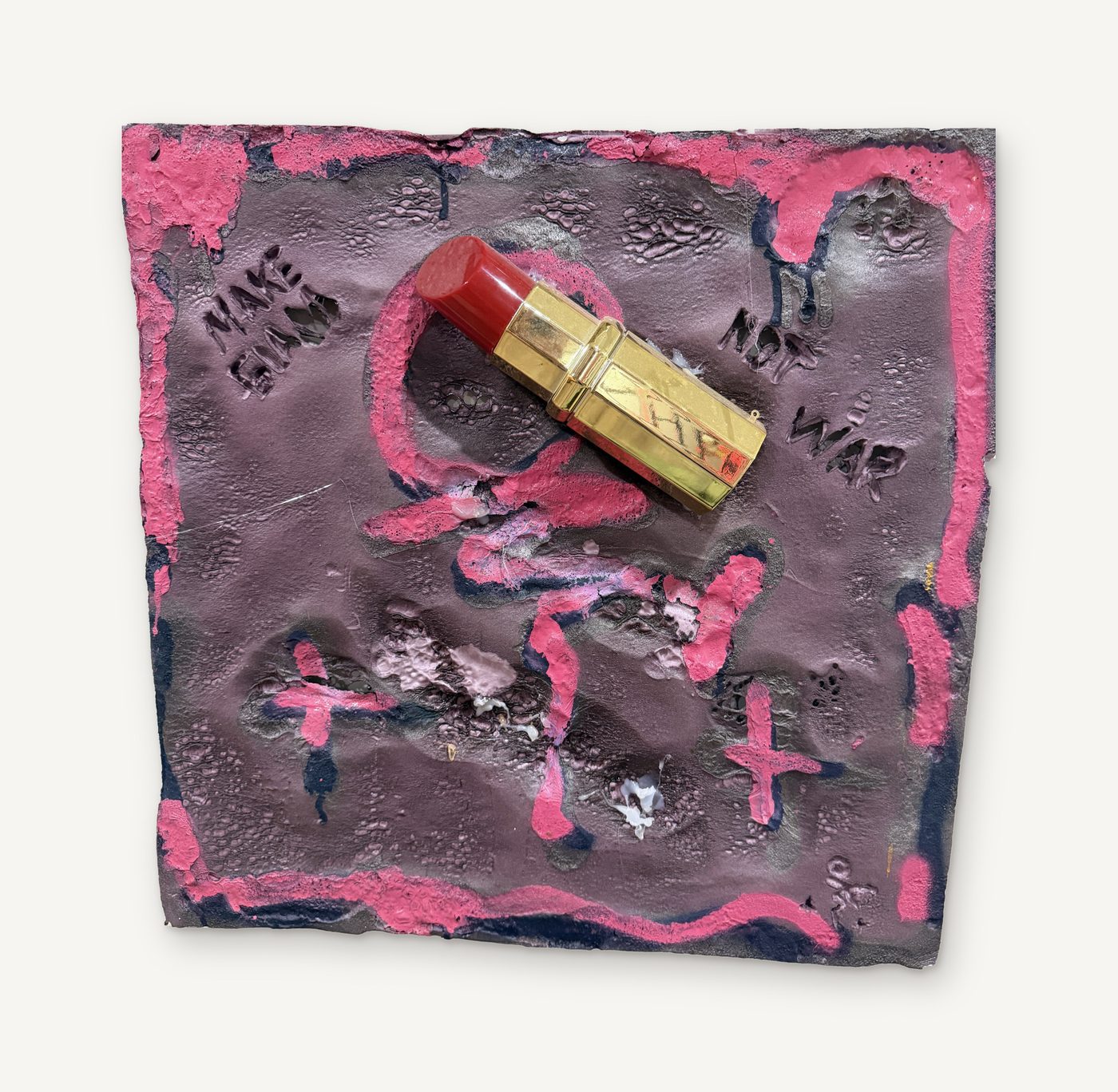 Make Glam Not War: a square violet panel edged in pink with a gold lipstick and the words Make Glam Not War