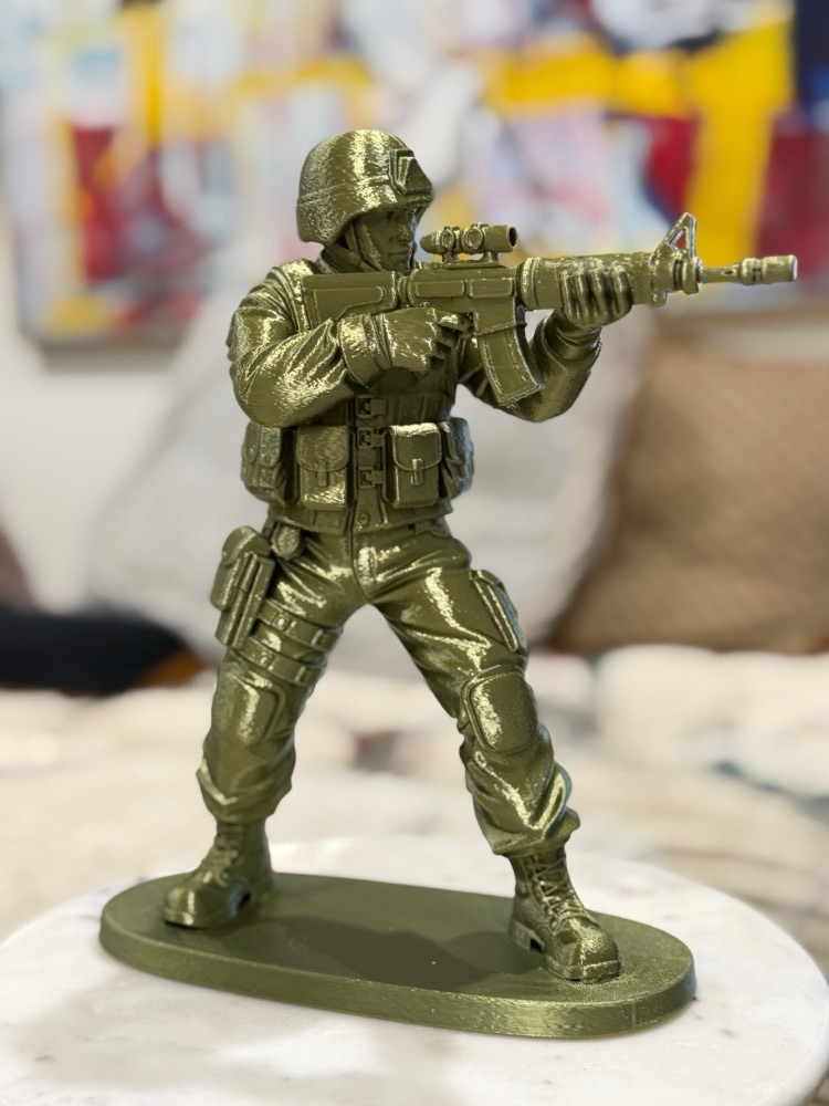 Standing Orders: modern rifleman aiming, olive metallic print