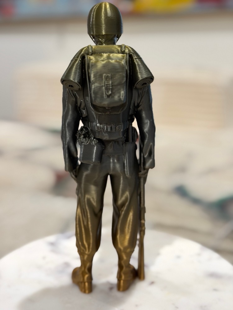 Standing Orders: infantryman from behind, pack and bedroll