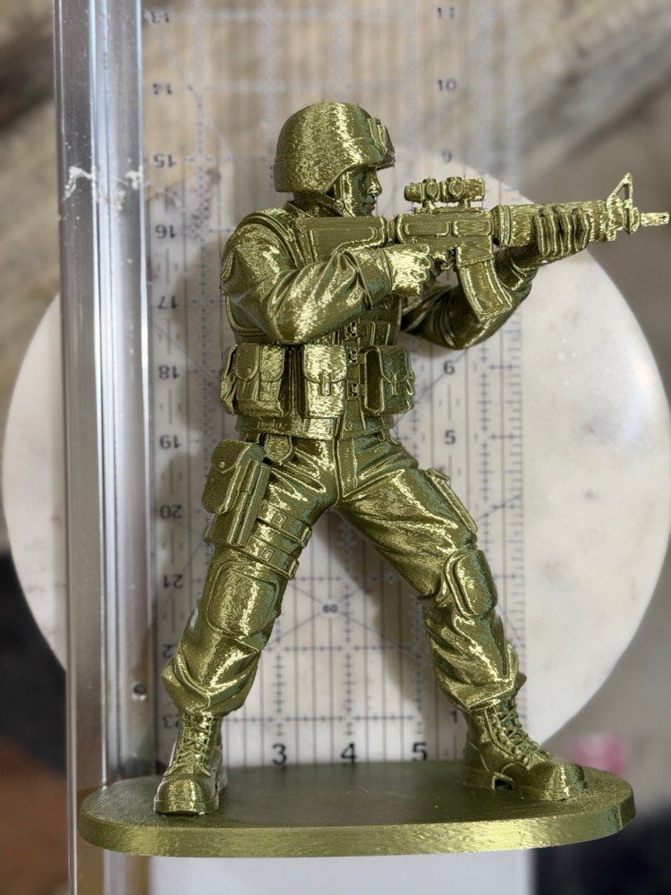 Standing Orders: rifleman against a ruler, about ten inches tall